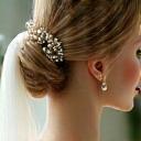 Bridal upstyle with pearls by The Cape Hair Studio